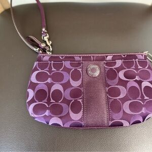 Coach Purple Clutch with Signature Pattern